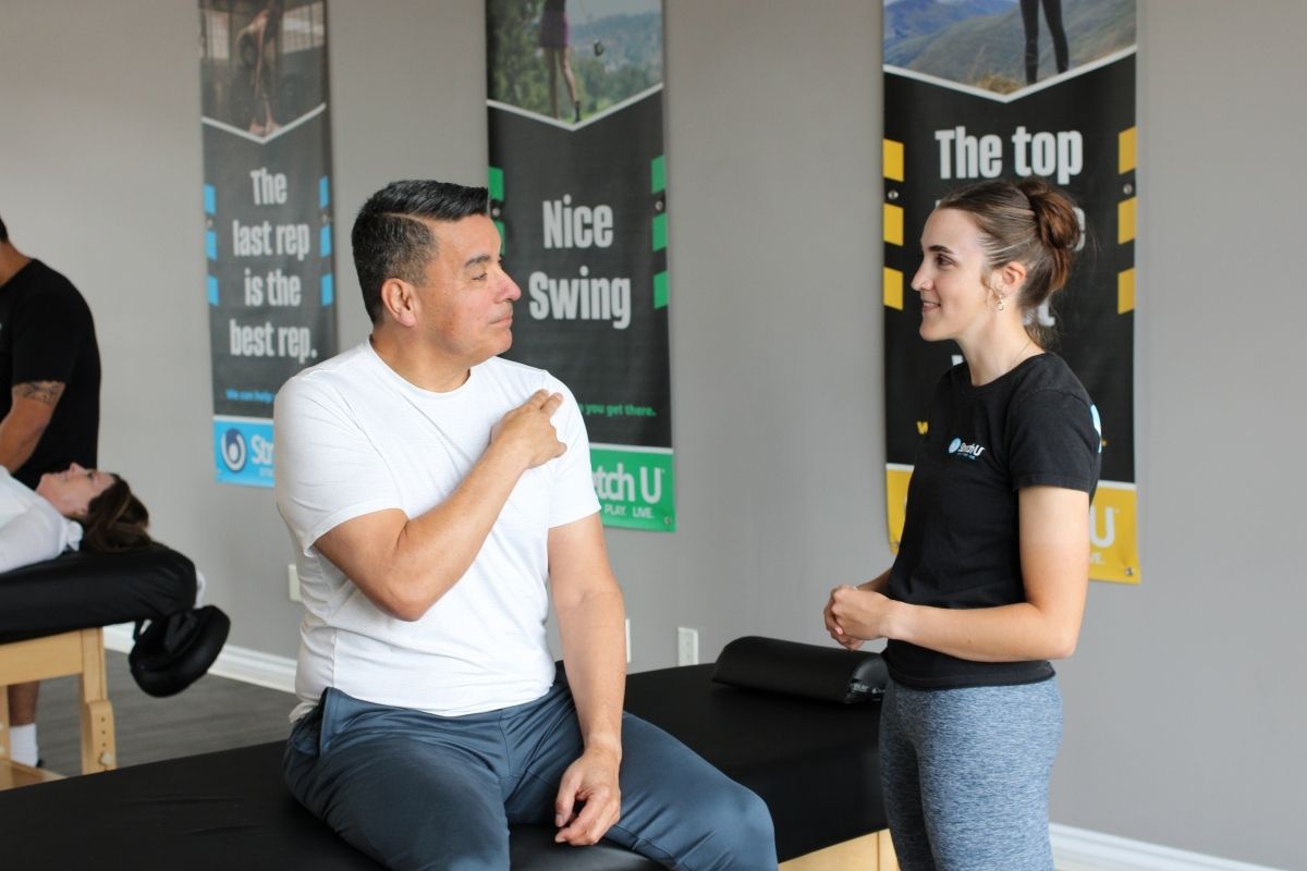 Client and Stretch U practicioner talking