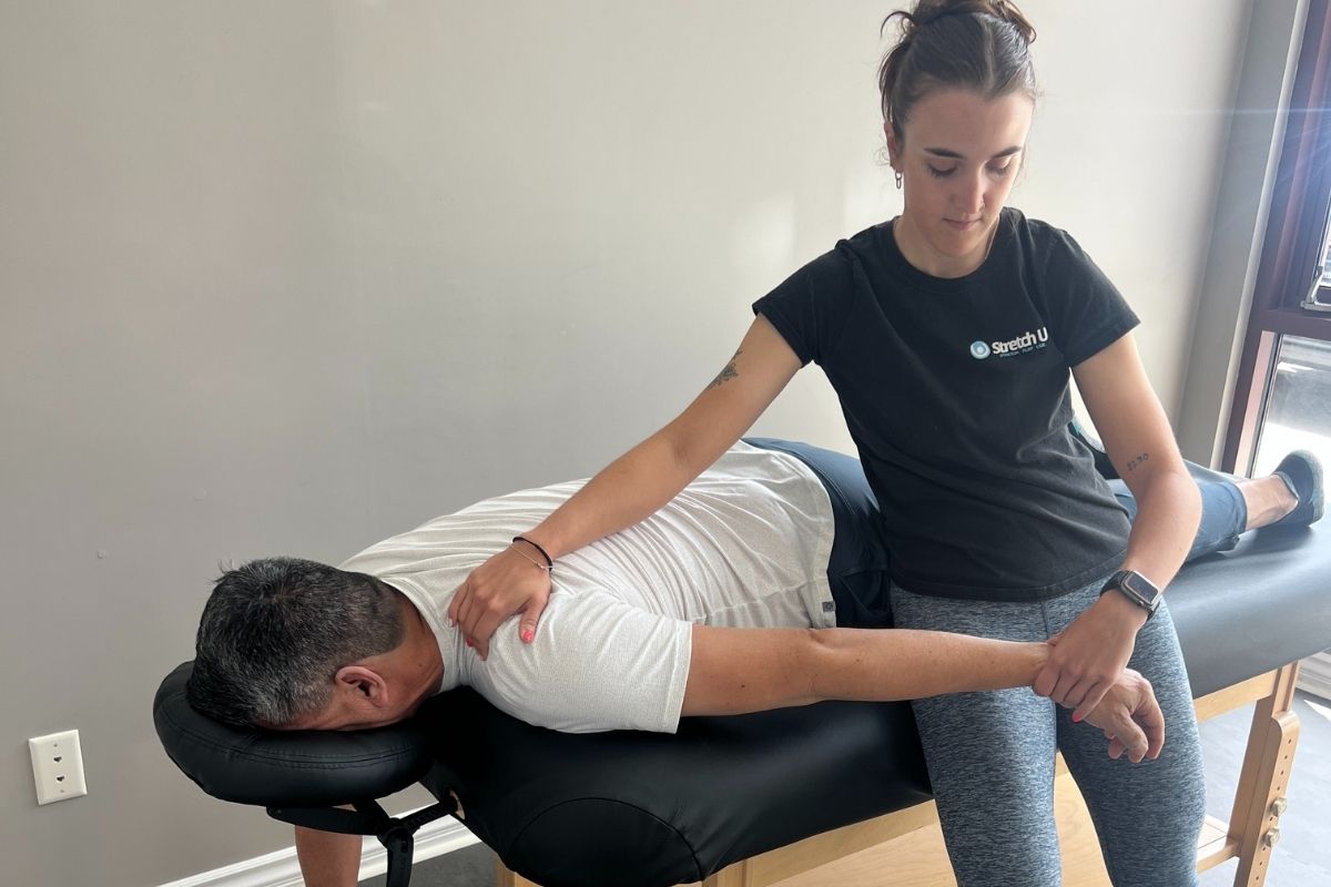 stretching a person's arm