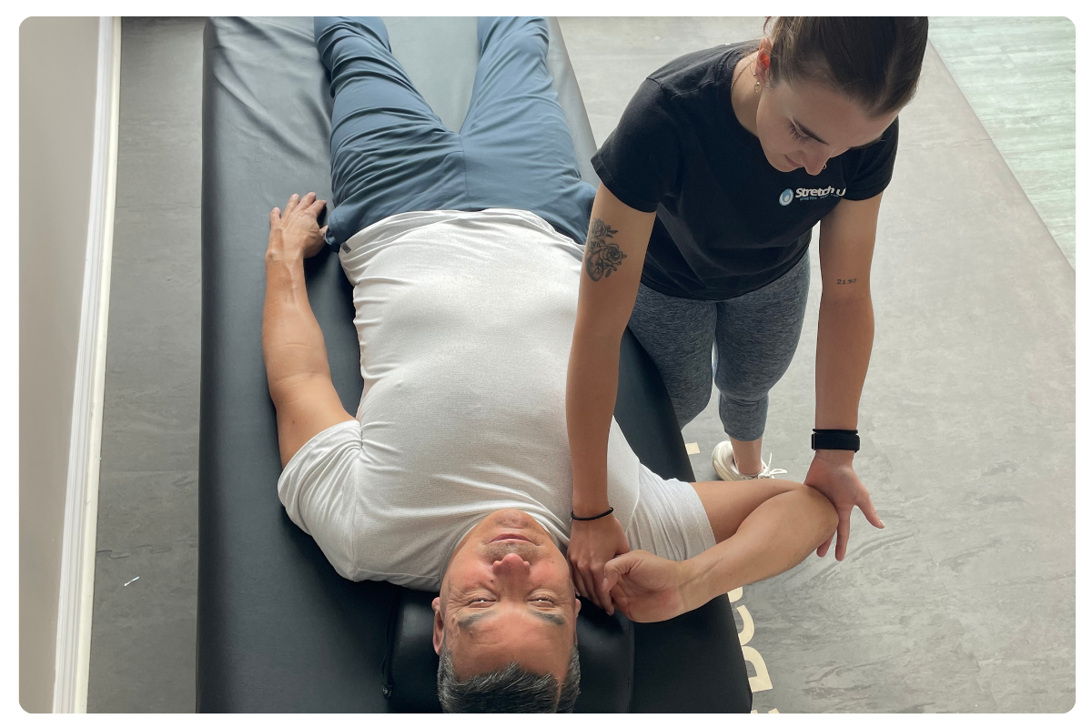 working on shoulders for neck pain relief