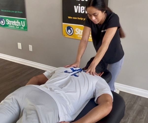hockey layer getting an assisted stretch