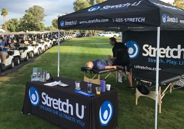 golfer getting a stretch after golfing